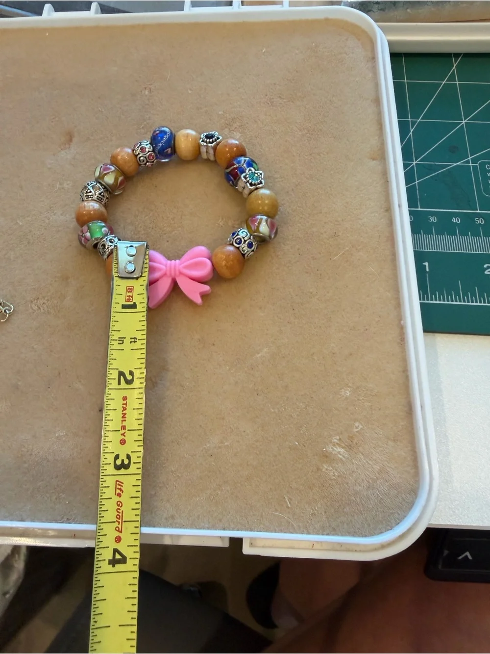 Hand Crafted Pink Bow and Wood-Tone Bead Bracelet - Picture 5 of 5